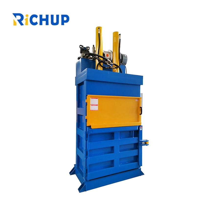 Waste paper baler machine